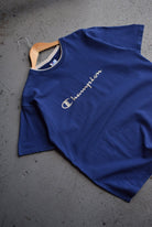 Vintage 90s Champion Embroidered Spellout Tee (L) - Retrospective Store